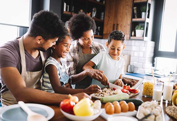 Happy family cooking together